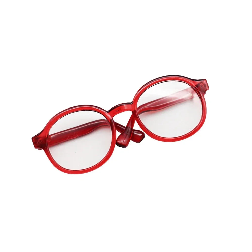Red eyeglasses on a white background