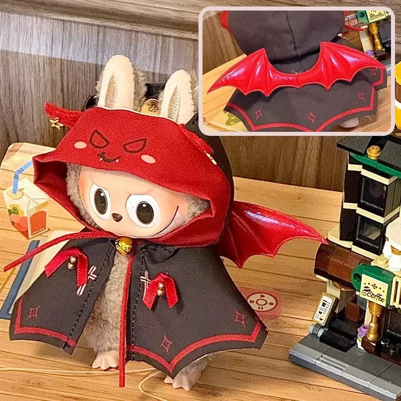Animated character in a red and black outfit with bat wings on a wooden surface.
