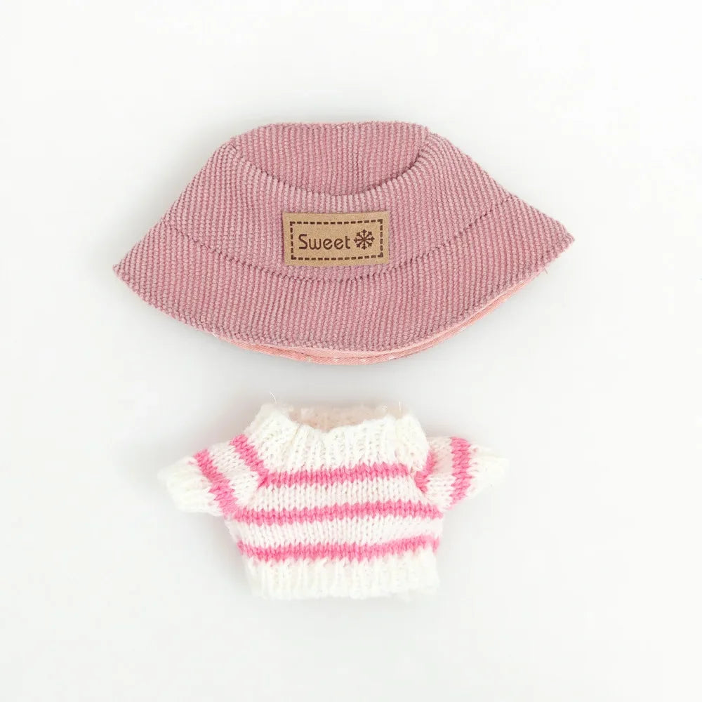 Pink and white striped baby outfit with a matching hat on a light gray background