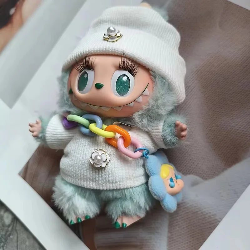 Toy figure with a colorful necklace and white hat on a neutral background