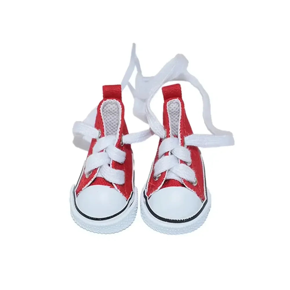 Red and white shoes with white laces on a white background