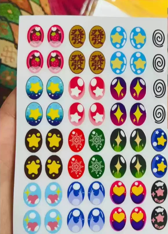 Colorful sticker sheet with various designs on a white background