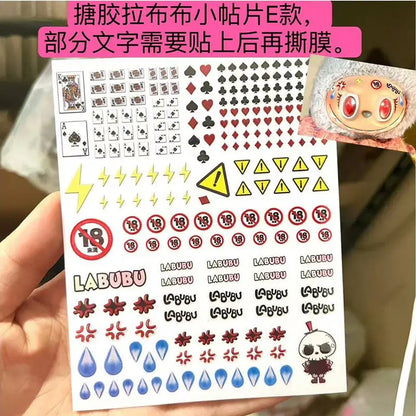 Sheet of stickers with various designs held by a hand, featuring the brand 'LABUBU'.